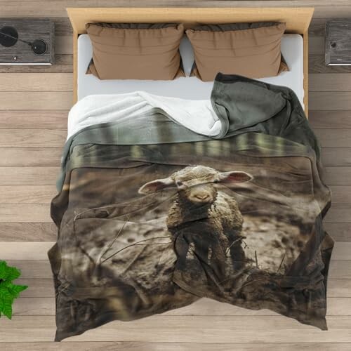 Jesus and Lamb Throw Blanket on a cozy bed