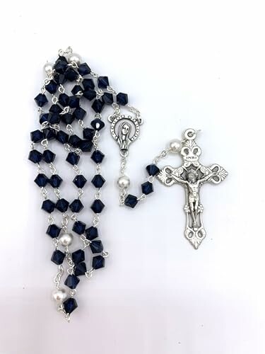 Rosary with blue beads and silver crucifix.