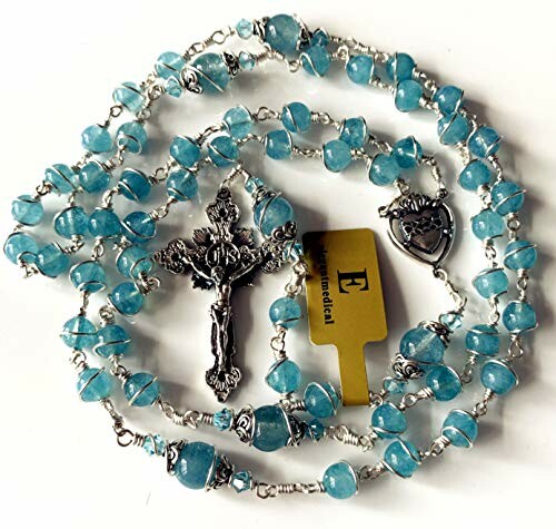 Blue rosary beads with crucifix and charm.
