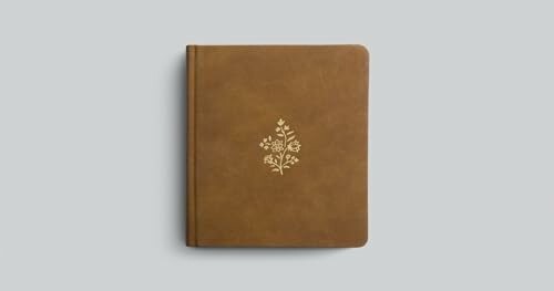 Brown notebook with floral design on cover