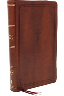Brown leather Holy Bible with a cross on the cover