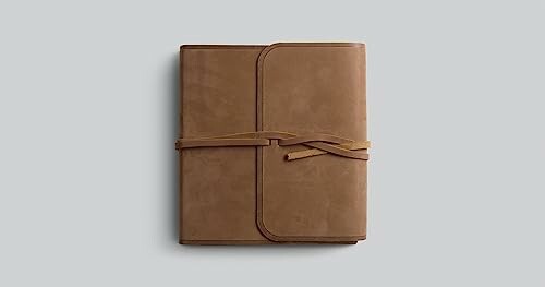 Brown leather journal with wraparound strap