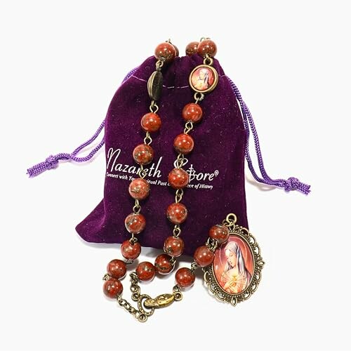 Catholic rosary beads with a purple pouch.