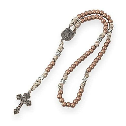 Catholic rosary beads with crucifix and medallion.