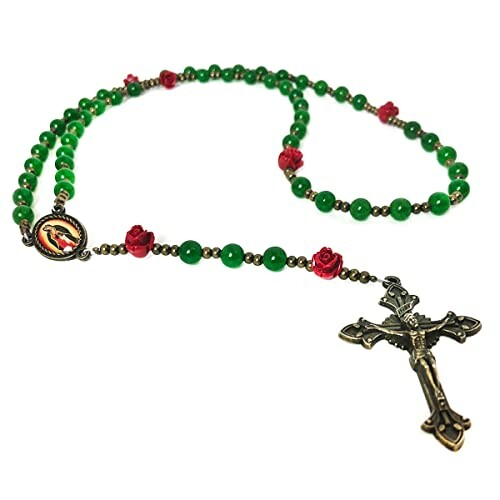 Green and red rosary beads with a crucifix