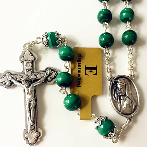 Green rosary with crucifix and religious medallion