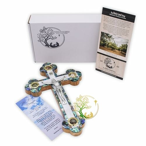 Religious cross with packaging and brochure from Holy Land Store.