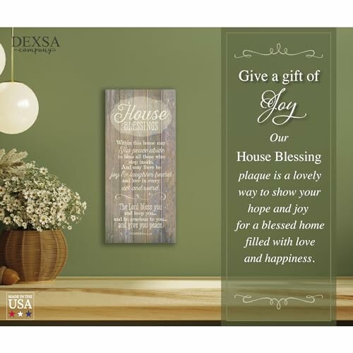 House Blessing plaque on a green wall with floral decor.