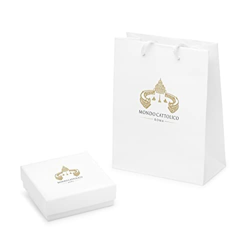 White Mondo Cattolico gift bag and box with gold logo.