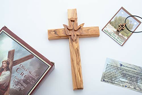 Olive wood cross with packaging and informational cards