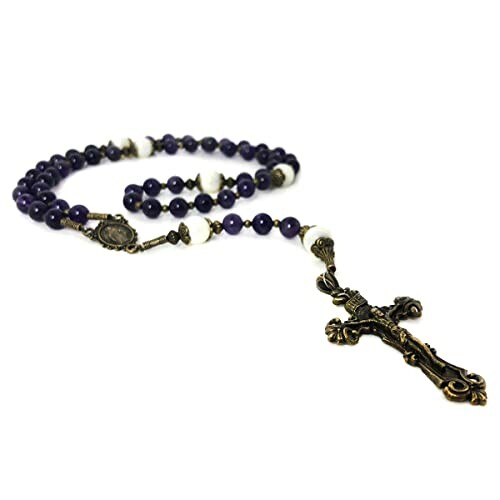 Purple rosary beads with a bronze crucifix