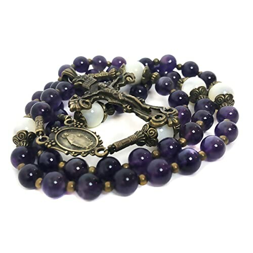 Purple rosary beads with crucifix and medallion