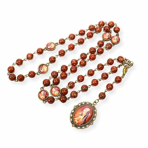 Red stone rosary necklace with religious images on medallions