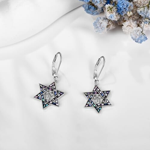 Star-shaped earrings with floral background