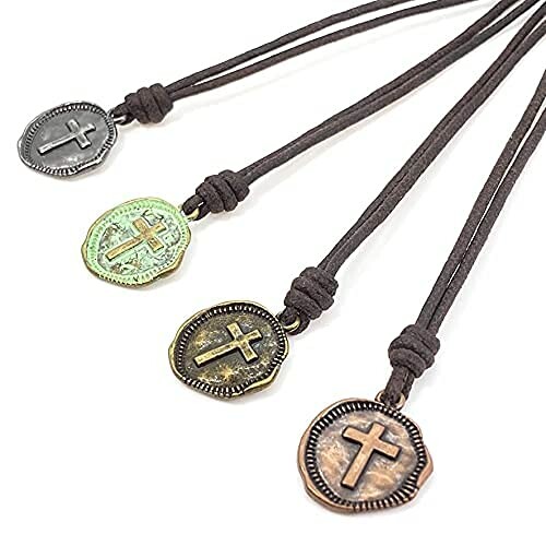 Four vintage cross pendant necklaces on leather cords.
