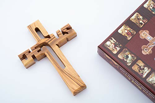 Wooden cross puzzle with a box on a light background