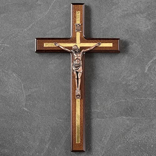 Wooden crucifix with Jesus figure on a wall.