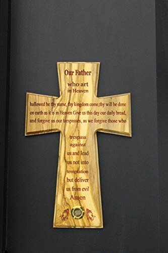 Wooden cross with the Lord's Prayer engraved on it.